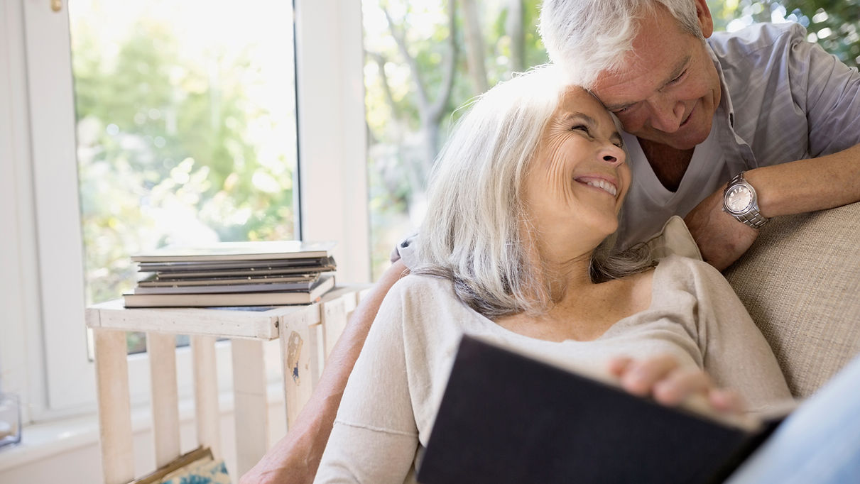 A senior couple sharing a warm moment together at home